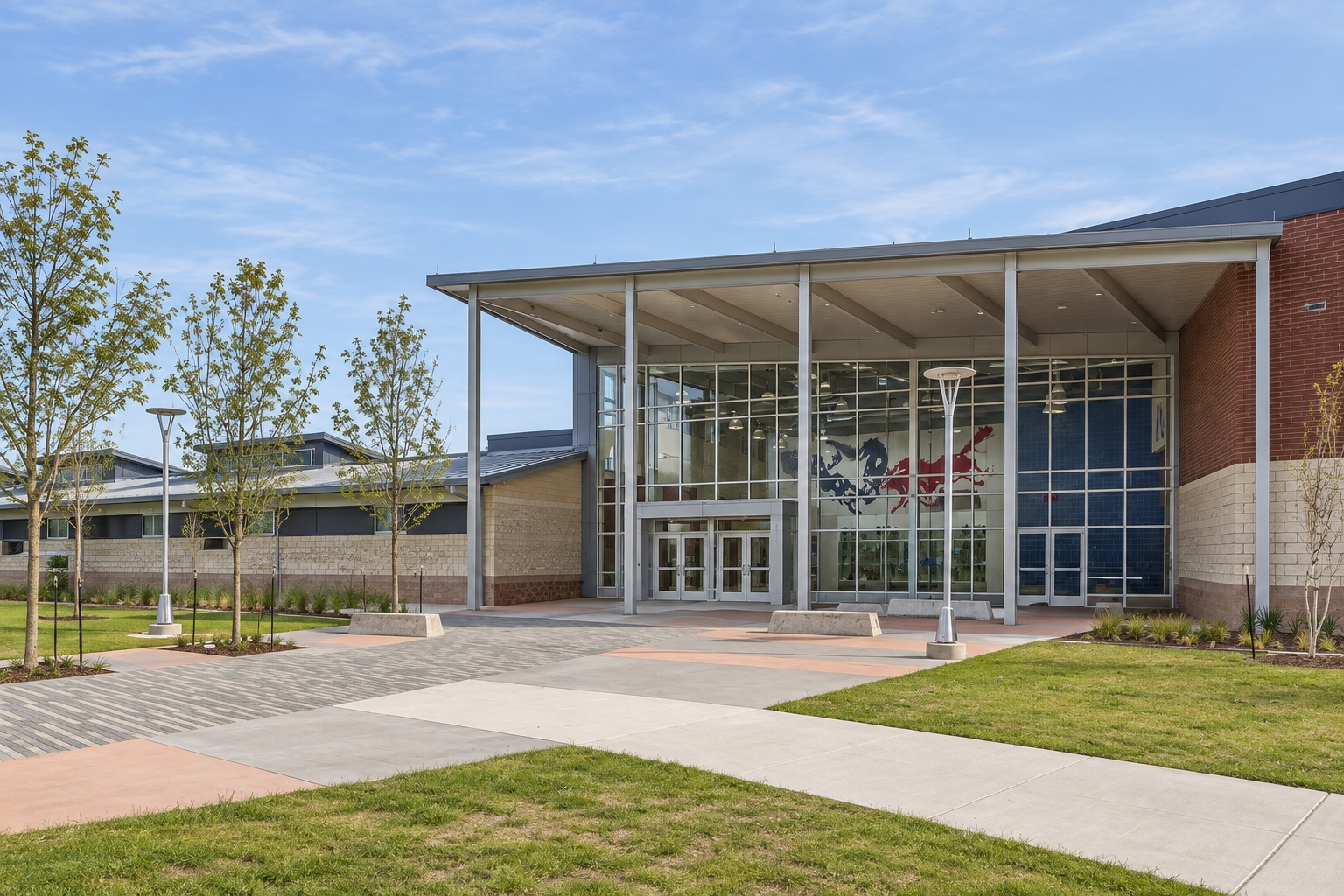 Campus illustration of Life High School Waxahachie’s glazed entrance and landscaped approach in daylight